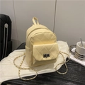 Mini mochila amarillo claro acolchada con patrón de rombos y cierre de giro plateado - Amarillo