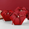 Elegant red leather wedding favor bag with pearl charm and golden Love is Eternal ribbon - Red