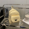 Gelber Mini-Rucksack mit Rautensteppung, Silberkette und Metall-Drehverschluss - Gelb