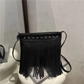 Black pebble leather crossbody bag with silver studs and long bohemian style tassels - Black