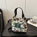 Floral print cream canvas bucket bag with black strap and green brand label detail - Purple Abstract Flower Style (Style 4)