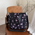 Sac à bandoulière en nylon noir avec motif floral rose et large sangle réglable - Noir