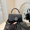 Elegant black sequin crossbody bag with a silver heart-shaped metal twist lock - Black