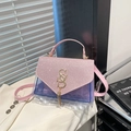 Pink glitter flap crossbody bag with gold SS logo fringe and clear purple quilted body - Pink