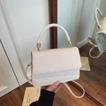 White crossbody bag with woven texture lid and scalloped edge detail for women - Off White