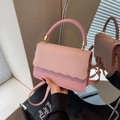 Pink crossbody bag with woven texture lid and elegant top handle for women - Pink