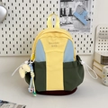 Mochila informal en bloques de color amarillo, azul y verde con un dije de nube - Sin Colgante / Amarillo