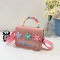 Rosa Kinderhandtasche mit Blumenanhängern, Perlengriff und glitzernden Pailletten - Dunkelrosa