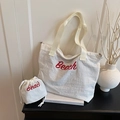 Set borsa tote bianca e pochette coordinata con stampa Beach in rosso sul davanti - Bianco