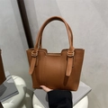 Brown litchi grain leather bucket handbag with vintage gold hardware and top handles - Brown
