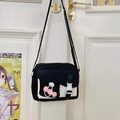 Borsa a tracolla chic in tela bianca e nera con patta asimmetrica e fibbia - Senza Pendente / Nero