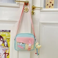 Sac bandoulière coloré aux tons bonbon avec corps bleu clair et détails roses - Vert