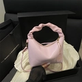 Light pink bucket bag with pleated cloud handle and vertical textured leather finish - Pink