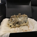 Elegante pochette da sera con paillettes dorate, manico in metallo e tracolla a catena - Oro