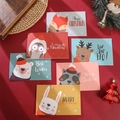 Close-up of festive Christmas cards featuring cute cartoon animals on a red background - 574#