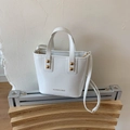 White mini tote bag in glossy faux leather with gold rivets and detachable shoulder strap - White