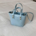Light blue patent leather tote bag with gold rivets and detachable shoulder strap - Blue
