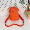 Vibrant orange nylon crossbody phone bag with drawstring closure and adjustable strap - Orange