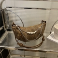 Vintage brown crescent crossbody bag with white stitching and decorative pearl chain - Brown