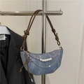 Light blue denim crescent bag with knotted leather strap and pearl chain detail - Blue