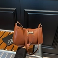 Caramel brown faux leather underarm bag with gold square buckle and zipper closure - Brown