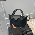 Bolso de mano minimalista negro con relieve de leopardo y cierre de plata mate - Negro