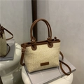 Bolso saco de paja con asas de cuero marrón y correa de hombro ajustable - Marrón