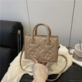 Elegant beige embossed PU leather crossbody bag with floral patterns and gold hardware - Khaki