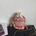Woven bucket bag with warm gradient colors, pearl buckle and stylish chain strap - Pink