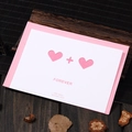 Carte de voeux blanche avec découpes de cœurs, enveloppe rose et texte Forever - Design Double Cœur (308#心+心)