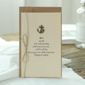 Vintage greeting card set with brown kraft envelope and bronze anchor charm detail - Anchor