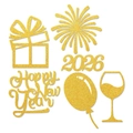Detailed view of 2026 New Year gold glitter confetti with fireworks and gift box shapes - Gold