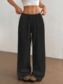 Pantaloni neri a gamba larga da donna con vita elastica a coulisse e tessuto con texture fitta - S / Nero