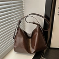 Deep brown leather oversized hobo bag with adjustable strap and vintage texture - Brown