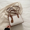 Borsa a mano alla moda in pelle bianca e marrone con manici superiori e tracolla sottile - Bianco