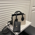 Woven crossbody handbag in beige and black with a detachable coin purse and strap - Black