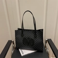 Black and grey tote bag with all-over M-letter print and large oval leather logo patch - Black