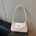 Borsa a spalla beige con stampa coccodrillo e raffinata chiusura a fiocco argento - Bianco Sporco
