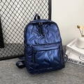 Navy blue metallic quilted backpack with adjustable straps and glossy finish - Blue