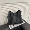 Minimalist black leather tote bag with wide shoulder strap for daily commuting women - Black