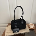 Retro black matte shoulder bag with mini coin purse set on a wooden table - Black