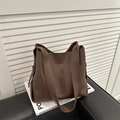 Minimalist dark brown leather tote bag with wide strap for stylish daily commuting - Brown