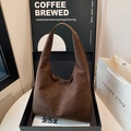 Minimalist deep brown suede hobo bag with a seamless strap for a vintage chic look - Brown