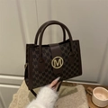 Dark brown retro monogram tote bag with gold M-logo buckle and double top handles - Brown