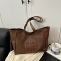 Minimalist brown pebbled leather tote bag with embossed logo and large capacity - Brown