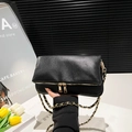Minimalist black pebbled leather underarm bag with gold chain and double zipper closures - Black