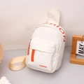 Close-up of white nylon chest bag for kids with orange zippers and FASHION logo detail - White