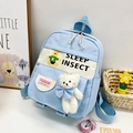 Zaino celeste per bambini con ciondolo a forma di orsetto e stampa di cartoni - Blu