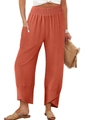 Detail of high waisted wide leg pants in brick red featuring elastic pleated waist - S / Coral