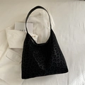 Borsa tote chic leopardata nera con consistenza scamosciata e tracolla in pelle - Nero